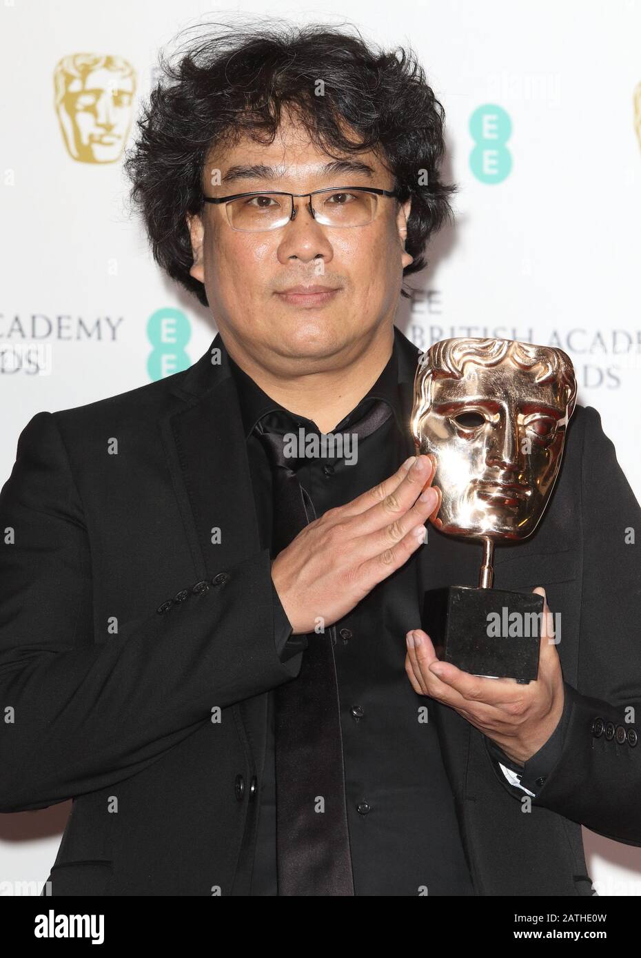 Bong Joon Ho - Bester fremdsprachiger Film für Parasiten während der BAFTA British Academy Film Awards - Siegerzimmer in der Royal Albert Hall. Stockfoto
