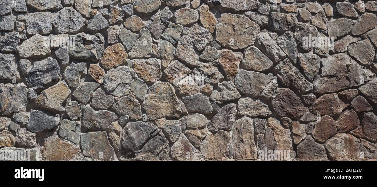 Stonewall, mit Naturstein dekorierte Mauer, Nahaufnahme Stockfoto