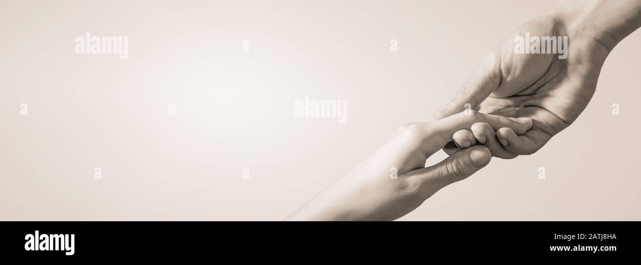 Lending helping hand. The concept of compassion, charity and love. Stockfoto