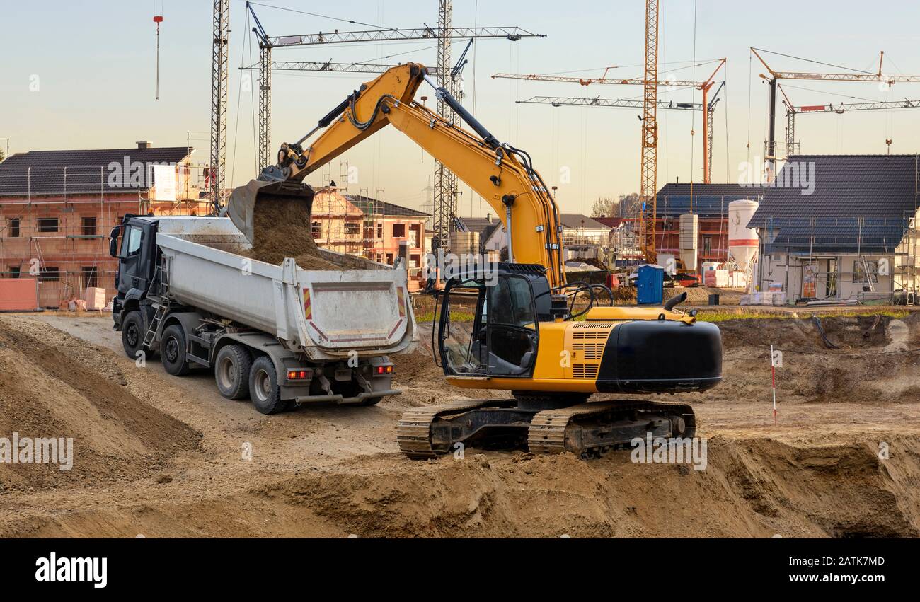 Bagger bei Bauarbeiten auf der Baustelle Stockfoto