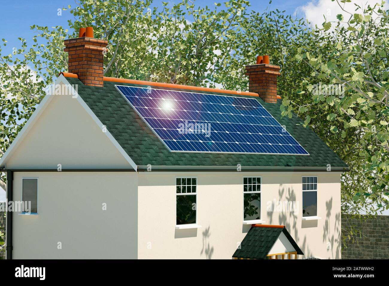 Modell eines traditionellen alten britischen Cottages mit Solarpaneelen auf dem Dach Stockfoto
