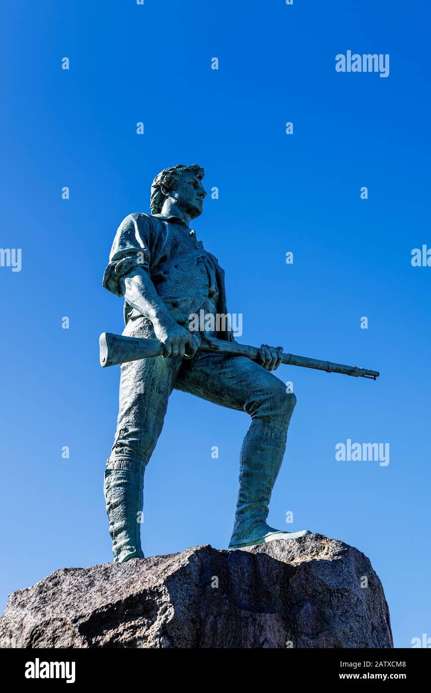 Minute Man Sculpture im Battle Green Park. Stockfoto