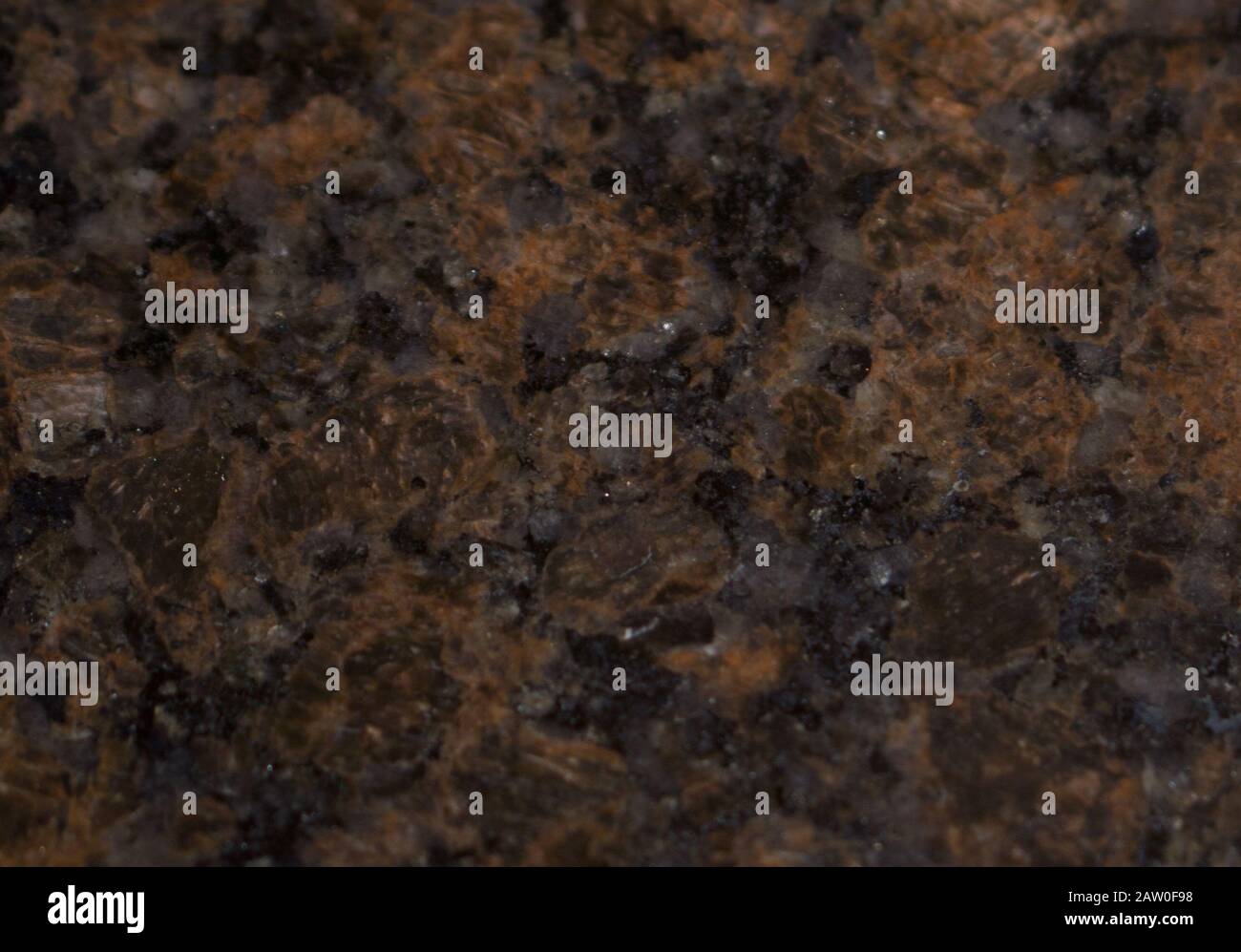 Materialtextur aus dunkelbraunem Marmor, nützlich als Hintergrund für Designarbeiten Stockfoto