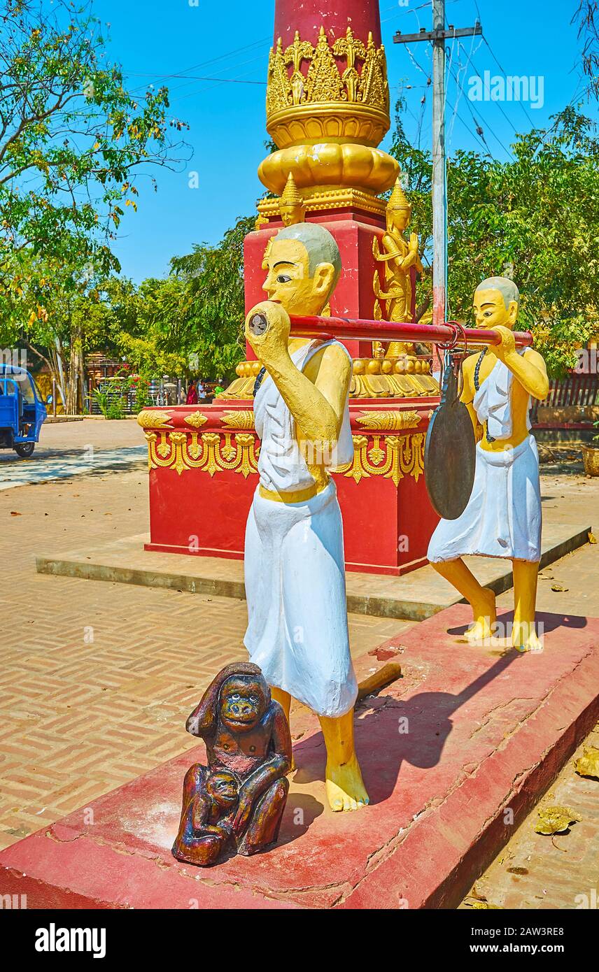 Die Skulpturen, die Gong für das buddhistische Ritual des Aufschlagens in der alten alo-daw-Pyi-Pagode tragen, die in der archäologischen Stätte von Bagan, Myanmar, erhalten sind Stockfoto