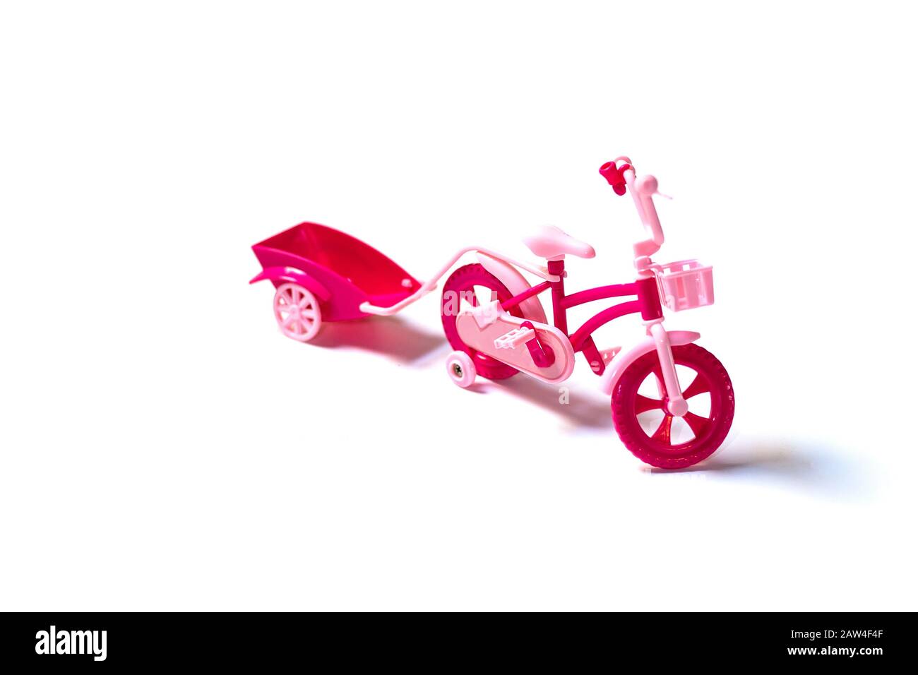 Spielzeugkarre pink isoliert für Puppen Stockfoto