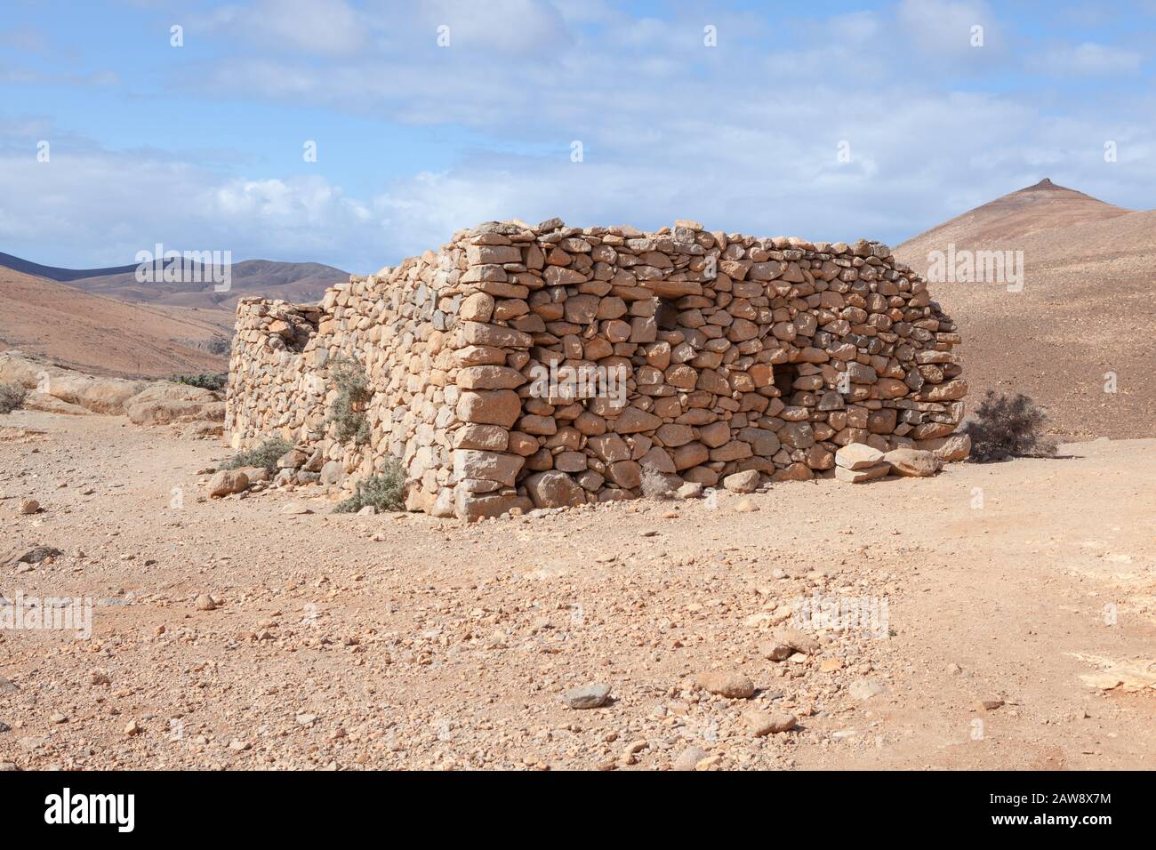 Überreste eines Steinhauses, Barranco de las Peñitas, Vega de Río Palmas, Fuerteventura, Kanarische Inseln Stockfoto