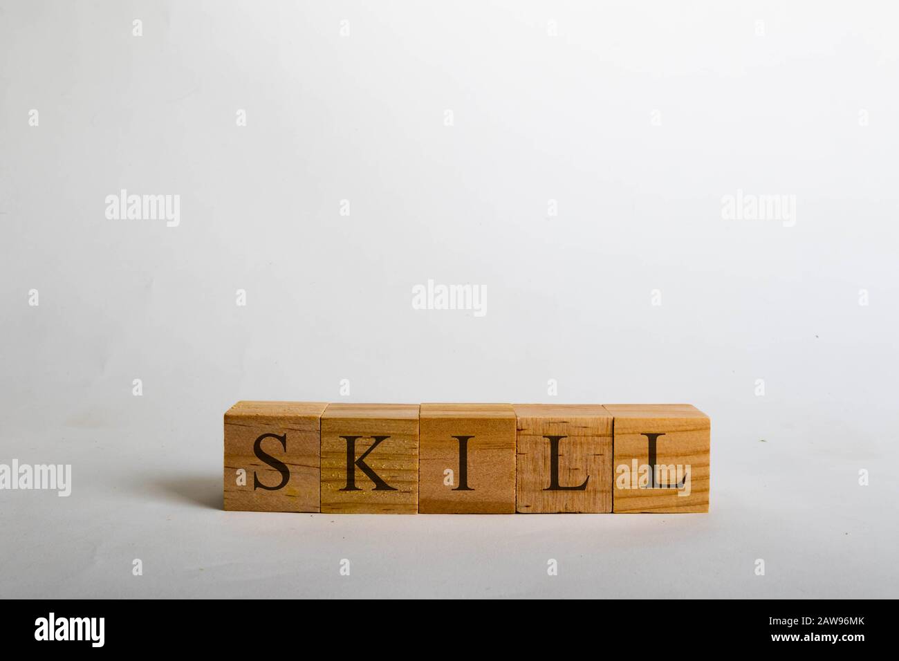 Holzwürfel mit Schrift Rechtschreibkunst. Geschäfts- oder Lebenskonzept Stockfoto