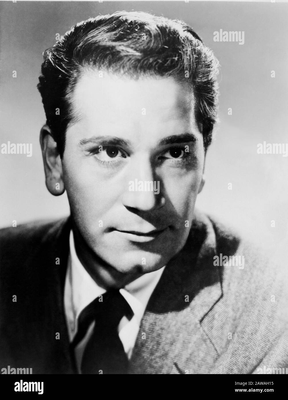 1953 Ca, HOLLYWOOD, LOS ANGELES, USA: Der Schauspieler RICHARD CONTE (* zwischen 1910 und 1975), Pubblicity still . - MUSICAL - DANZA - FILM - KINO - PORTRÄT Stockfoto