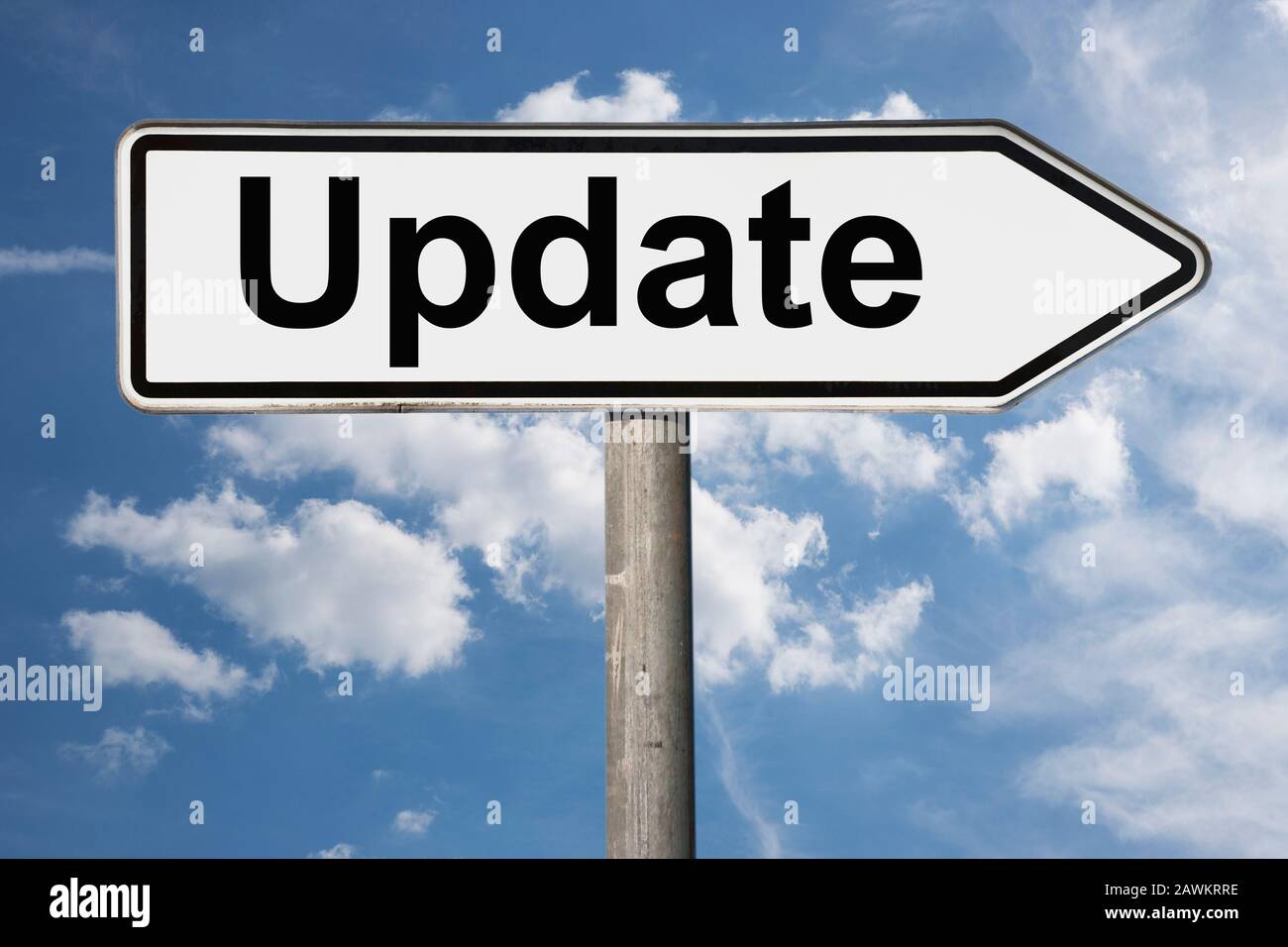 Detailfoto eines Wegweisers mit der Aufschrift Update Stockfoto