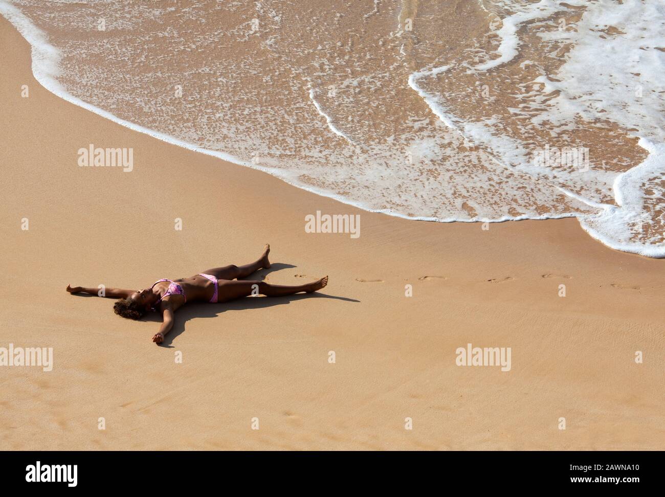 Gesunde weibliche Reklame am Strand von Big Beach, Maui, Hawaii. Stockfoto