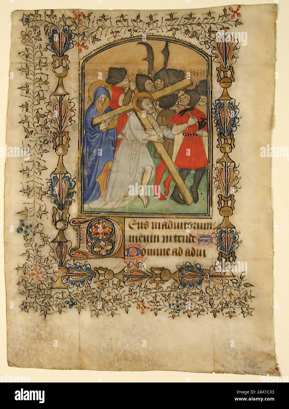 Handschriftenblatt aus einem Stundenbuch, Das Ein Beleuchtetes Erstes D und Christus Mit dem Kreuz zeigt, 1390-1400. Stockfoto