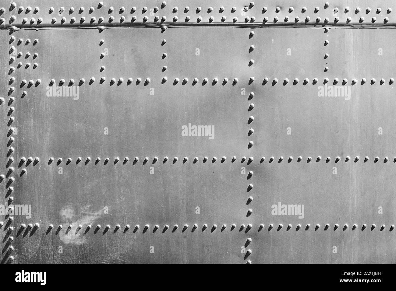 Abstrakte detail von Rumpf und Nieten auf eine militärische Flugzeuge Stockfoto