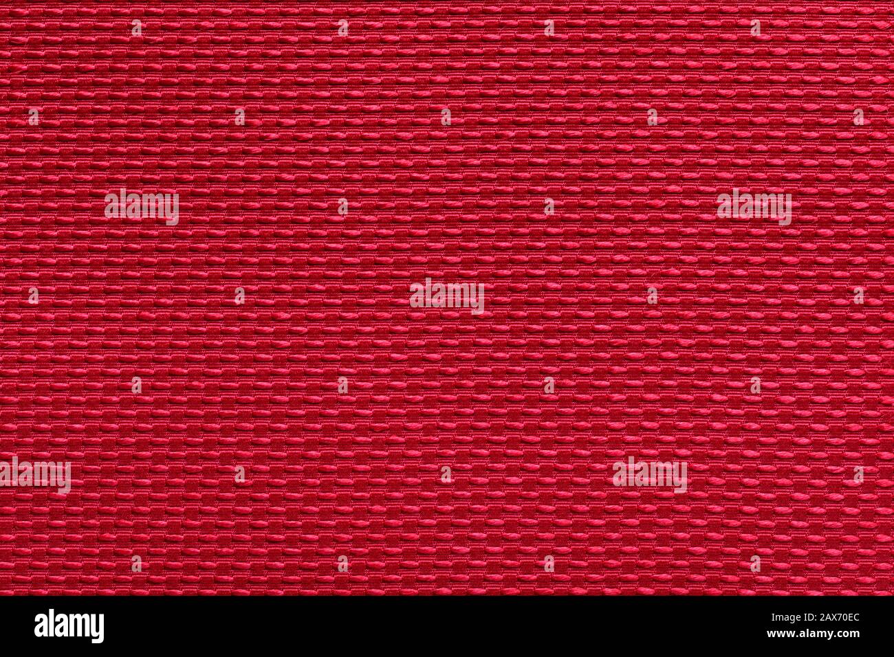 Stoff mit abstraktem Muster. Rote Faserstruktur Polyester Nahaufnahme. Feiner Filzstoff Hintergrund. Stockfoto