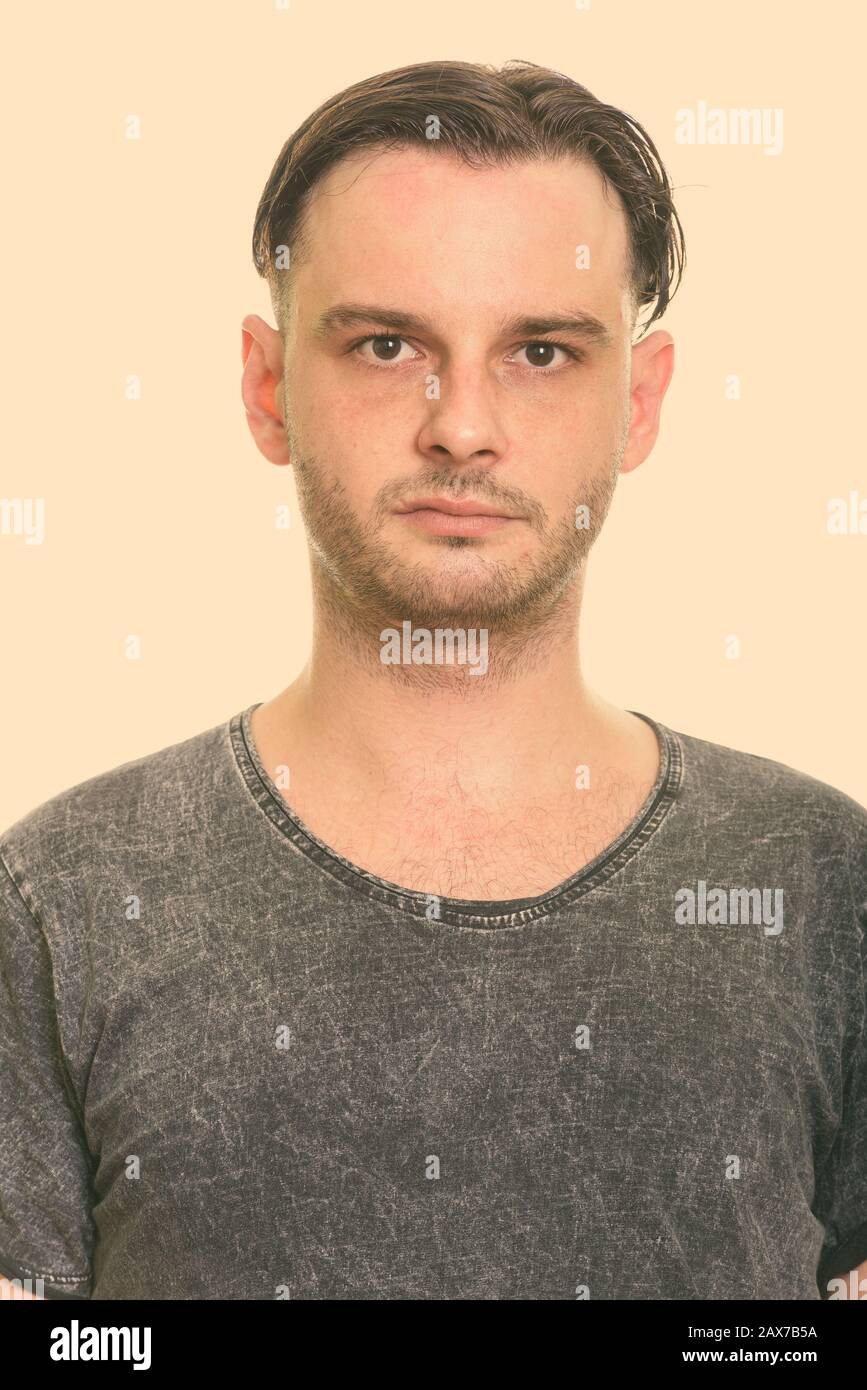 Gesicht des jungen Mannes mit Bartstoppel Stockfoto