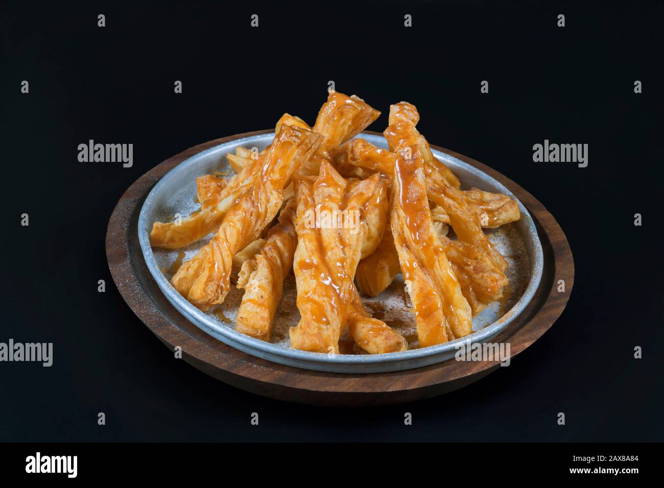 Khari einen indischen Imbiss mit Honig verdreht Stockfoto