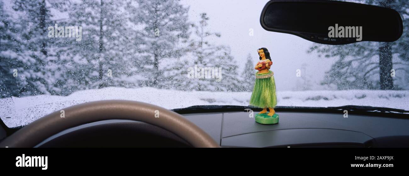 Car dashboard hula girl -Fotos und -Bildmaterial in hoher