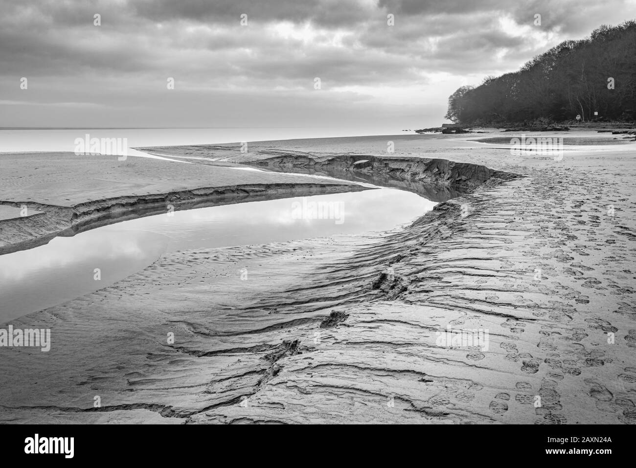 Kanäle, die durch den Sand von New Barns, Arnside, Cumbria schneiden. Stockfoto