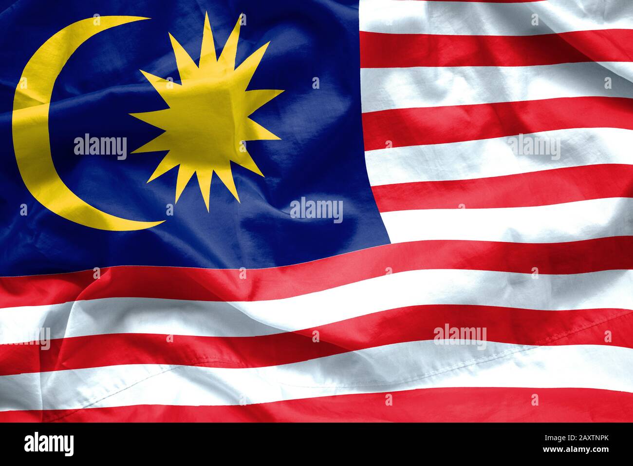 Hintergrund der Flagge in Malaysia. Nahaufnahme der im Wind wehenden Flagge Malaysia Stockfoto