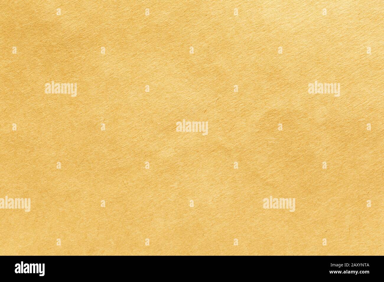 Abstrakte gelbe Hintergrundtextur, goldene Folienplakette. Stockfoto