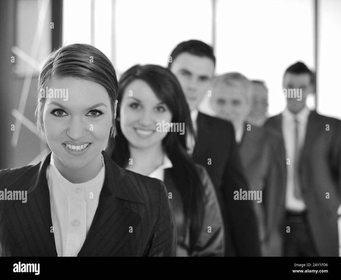 Gruppe von Geschäftsleuten in einer Schlange stehen Stockfoto