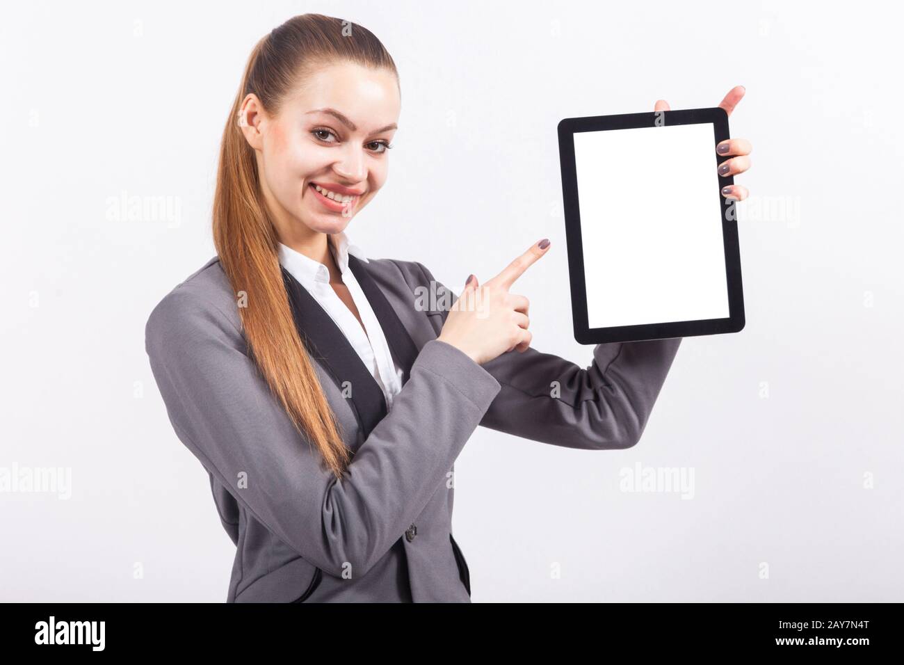 Hübsche Business Lady mit Tablet Stockfoto