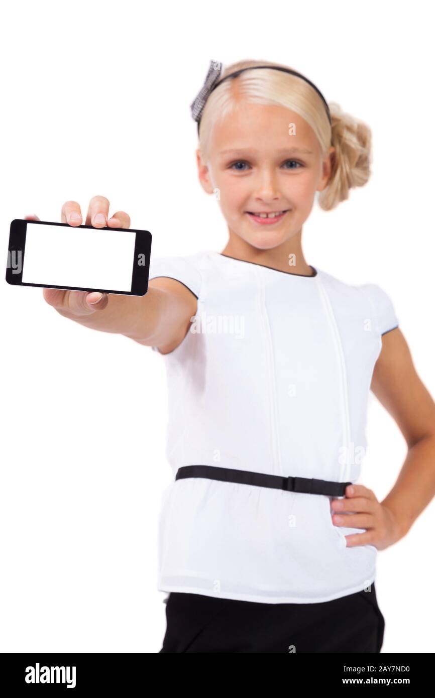 Schulmädchen mit Handy in der Hand, die Kamera und s betrachtet Stockfoto
