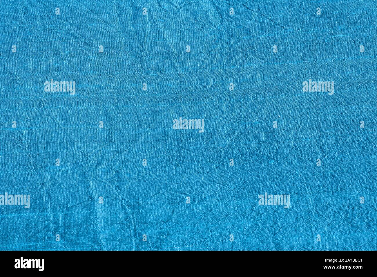 Textur aus blauem Seidenstoff mit Schlankung als textiler Hintergrund Stockfoto