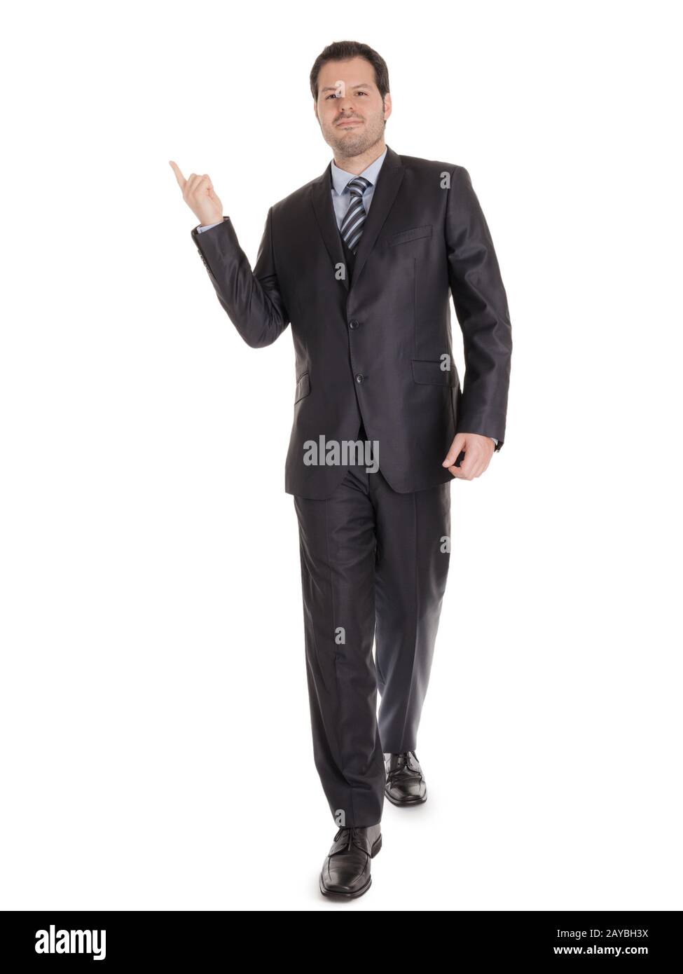 Smart Businessman in einem schwarzen Anzug in voller Körperlänge isoliert auf weißem Hintergrund. Geschäftskonzept Stockfoto