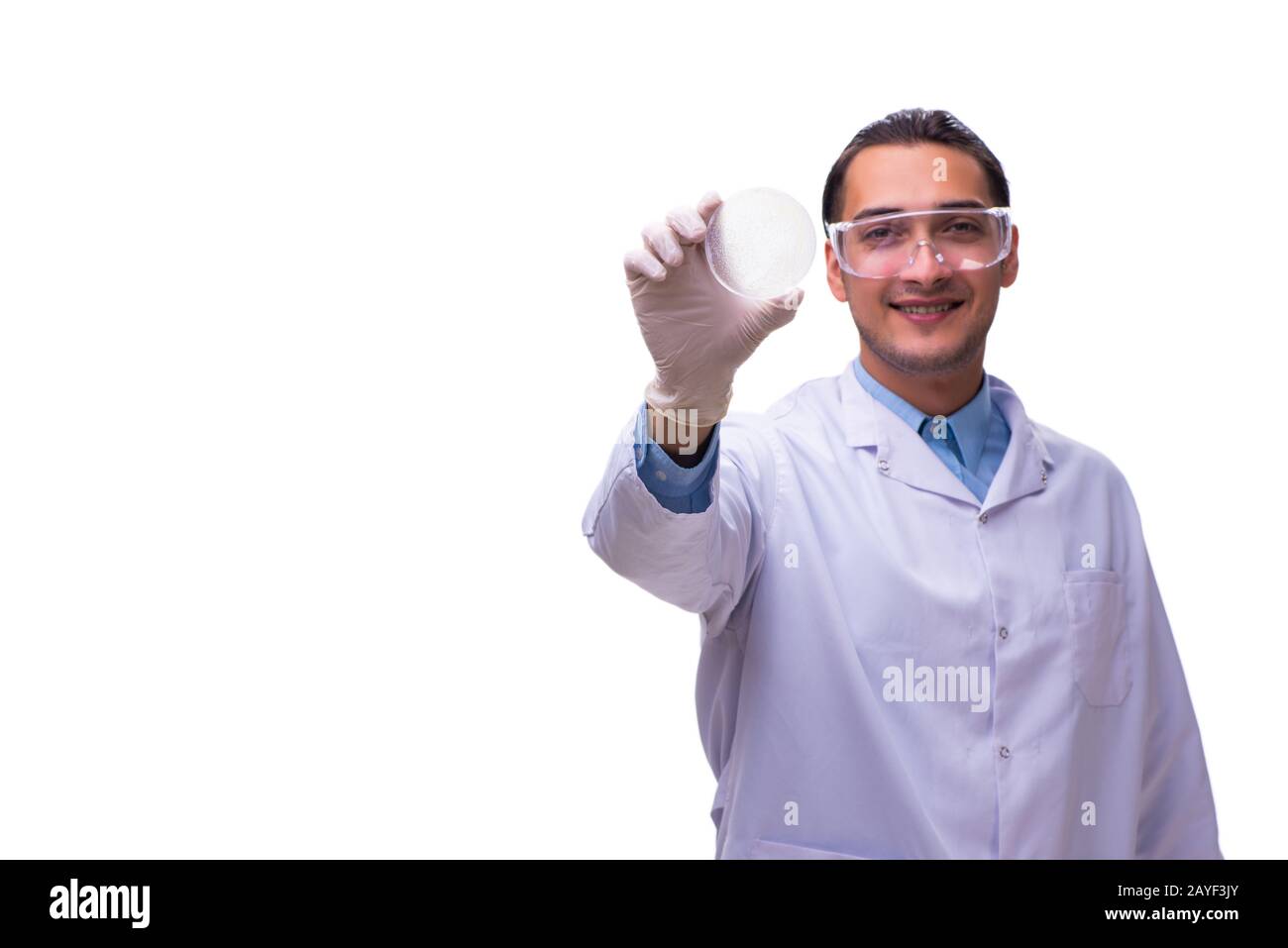 Junge männliche Chemiker isoliert auf weißem Stockfoto