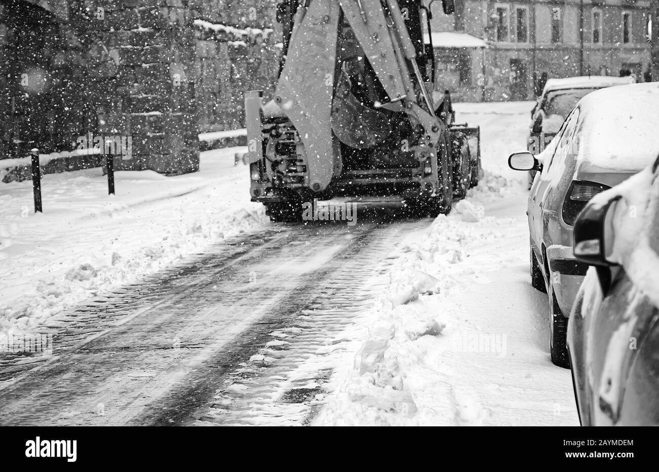 Schneefräse auf städtischer Straße, Gefahrentransport, Fahrzeug Stockfoto