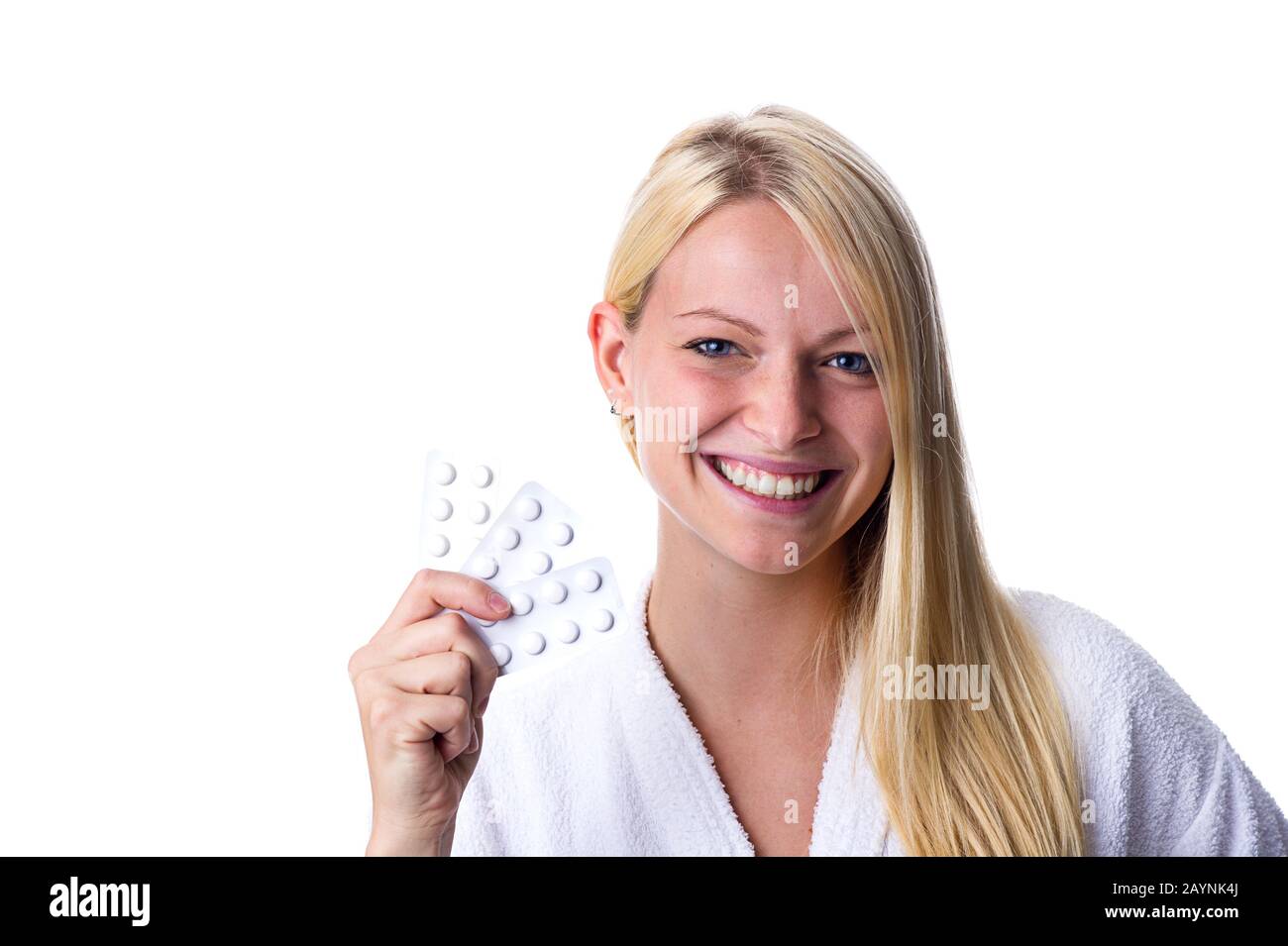 Frau mit Pillenpackung im MUND Stockfoto