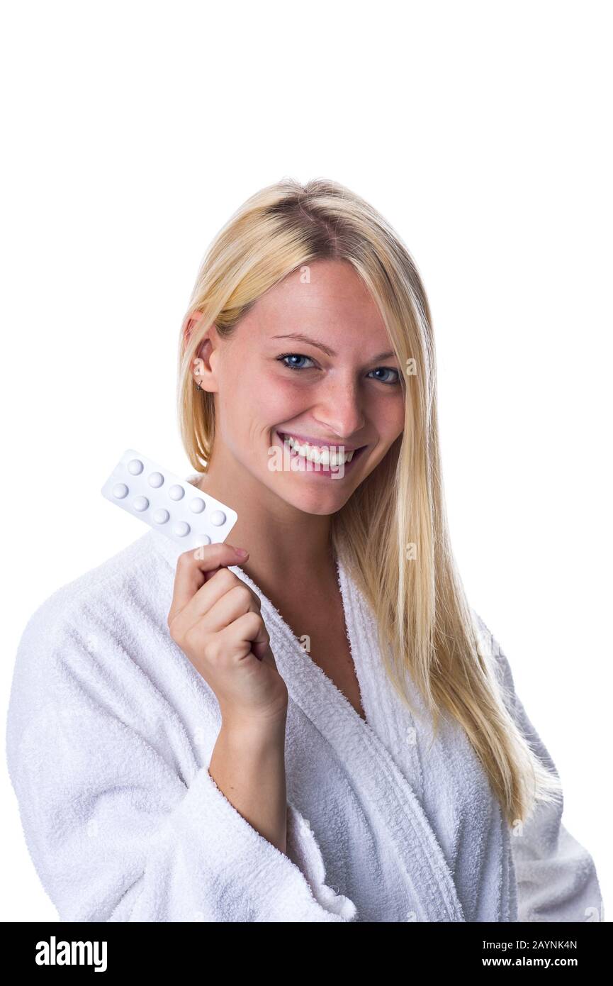 Frau mit Pillenpackung im MUND Stockfoto