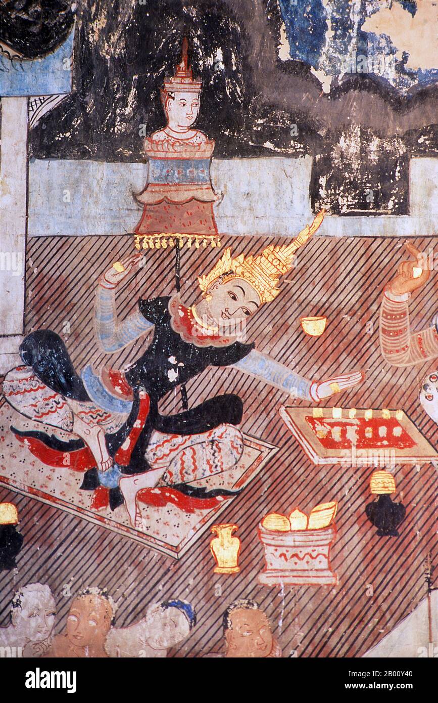 Thailand: Prinz Siddhartha und ein Dämon spielen Schach in einem Wandbild im Wat Buak Krok Luang, Chiang Mai, nordthailand. Siddhartha Gautama war ein spiritueller Lehrer aus dem alten Indien, der Buddhismus gründete. Der Zeitpunkt seiner Geburt und Tod sind ungewiss: Die meisten frühen 20. Jahrhundert Historiker datierten sein Leben als c. 563 BCE bis 483 BCE, aber neuere Meinung datiert seinen Tod zwischen 486 und 483 BCE oder, nach einigen, zwischen 411 und 400 BCE. Wat Buak Khrok Luang, in Chiang Mai gelegen, ist ein kleiner und typisch nordthailändischer buddhistischer Tempel, der angeblich im 15. Jahrhundert gegründet wurde. Stockfoto