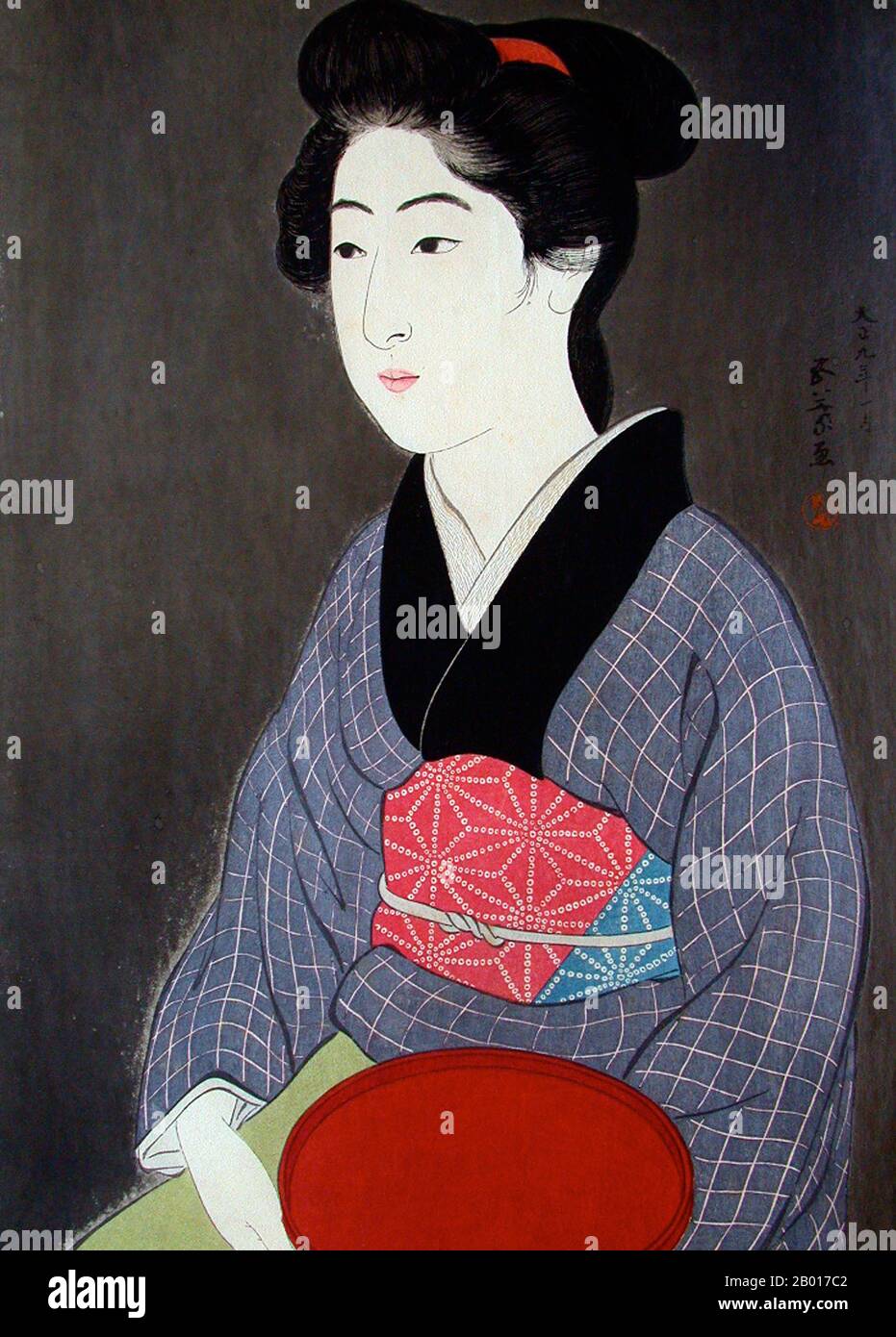 Japan: 'Frau mit Tablett'. Ukiyo-e Holzschnitt von Hahsiguchi Goyo (21. Dezember 1880 - 24. Februar 1921), 1920. Hashiguchi Goyo war ein Künstler der Shin Hanga Bewegung. Shin Hanga ('New Prints') war eine Kunstbewegung im Japan des frühen 20th. Jahrhunderts während der Taishō- und Shōwa-Periode, die traditionelle Ukiyo-e-Kunst, die in der Edo- und Meiji-Zeit (17th.-19th. Jahrhundert) verwurzelt war, wiederbelebte. Die Bewegung blühte von etwa 1915 bis 1942, obwohl sie kurz von 1946 bis 1950s wieder aufgenommen. Stockfoto