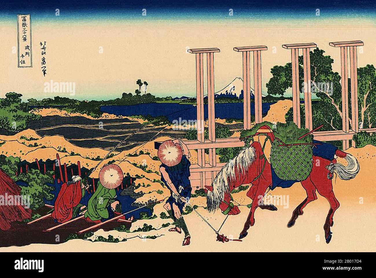 Japan: ‘Senju in der Provinz Musashi’. Ukiyo-e Holzschnitt aus der Serie ‘Thirty-Six views of Mount Fuji’ von Katsushika Hokusai (31. Oktober 1760 - 10. Mai 1849), 1830. ‘Thirty-Six Views of Mount Fuji’ ist eine Serie von Holzschnitten der japanischen Künstlerin Katsushika Hokusai, die „Sukiyo-e“ ‘. Die Serie zeigt den Fuji in unterschiedlichen Jahreszeiten und Wetterbedingungen an verschiedenen Orten und Entfernungen. Es besteht tatsächlich aus 46 Drucken, die zwischen 1826 und 1833 entstanden sind. Die ersten 36 wurden in die Originalpublikation aufgenommen, und aufgrund ihrer Popularität wurden nach der Originalpublikation 10 weitere hinzugefügt. Stockfoto