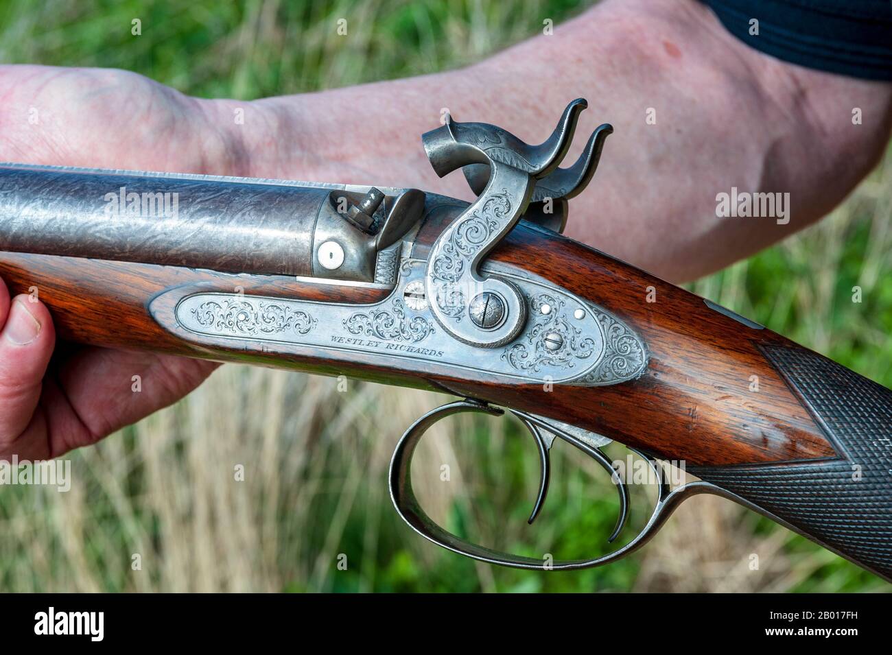 Eine Doppel-Barrel-Schlagschrotflinte mit 11 Bohrungen von Birmingham, England, dem britischen Waffenhersteller Westley Richards, die im Jahr 1841 als Stockpistole für ihren Londoner Agenten William Bishop hergestellt wurde Stockfoto