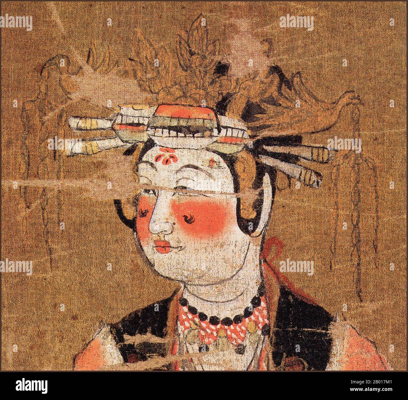 China: Eine wohlhabende Spenderin, die auf dem Höhepunkt der zeitgenössischen Mode gekleidet und aufgemacht wurde. Hängende Schriftrolle Malerei, Mogao Höhlen, Dunhuang, c. 950-1000. Die Mogao-Höhlen oder Mogao-Grotten (Chinesisch: mògāo kū, auch bekannt als die Höhlen der Tausend Buddhas und Dunhuang Höhlen) bilden ein System von 492 Tempeln 25 km (15,5 Meilen) südöstlich des Zentrums von Dunhuang, einer Oase, die strategisch an einer religiösen und kulturellen Kreuzung an der Seidenstraße in der Provinz Gansu, China, liegt. Die Höhlen enthalten einige der schönsten Beispiele buddhistischer Kunst, die sich über einen Zeitraum von 1.000 Jahren erstreckt. Stockfoto