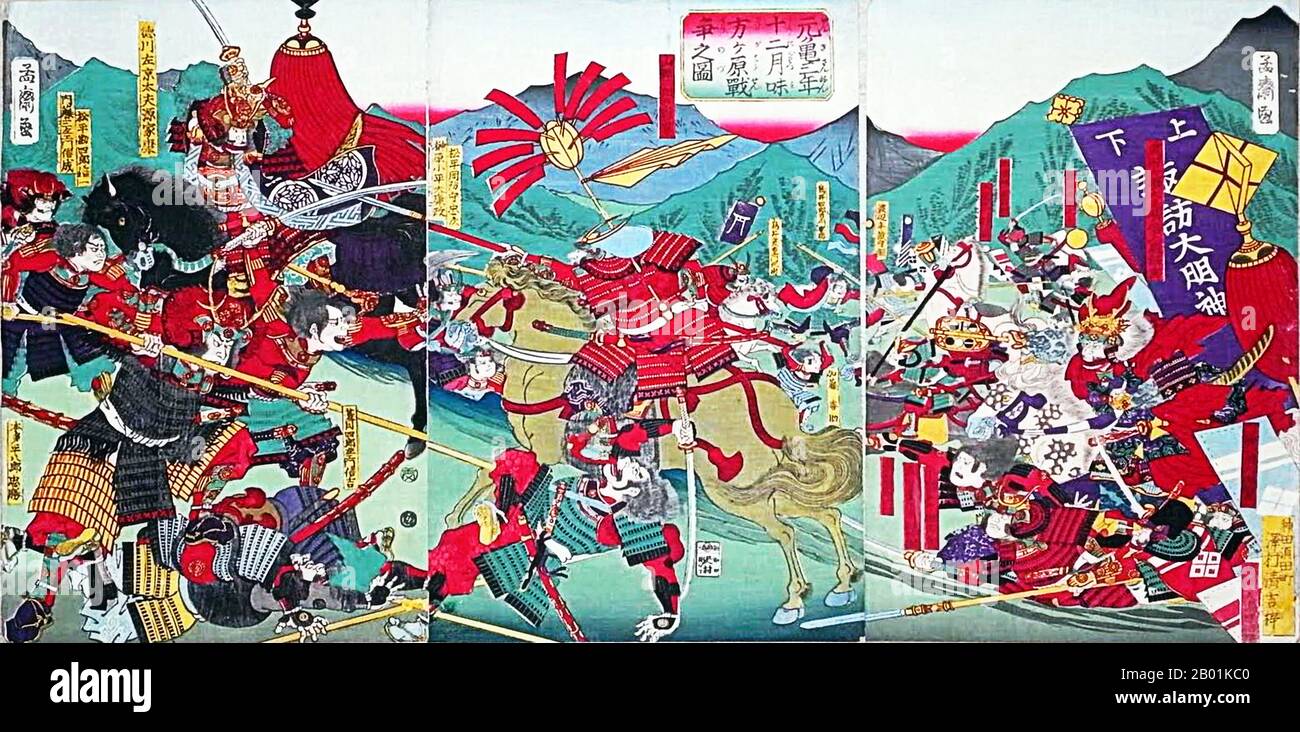 Japan: Die Schlacht von Mikatagahara zwischen den siegreichen Truppen von Takeda Shingen und den Truppen von Tokugawa Ieyasu. Ukiyo-e Holzschnitt Triptychon von Utagawa Yoshitora (fl. 1850-1880), 1874. Die Schlacht von Mikatagahara (25. Januar 1573) war eine der berühmtesten Schlachten von Takeda Shingens Feldzügen und eine der besten Demonstrationen seiner auf Kavallerie basierenden Taktik. Die Schlacht führte zu einem Sieg der Takeda und einem erfolgreichen Tokugawa-Rückzug. Stockfoto