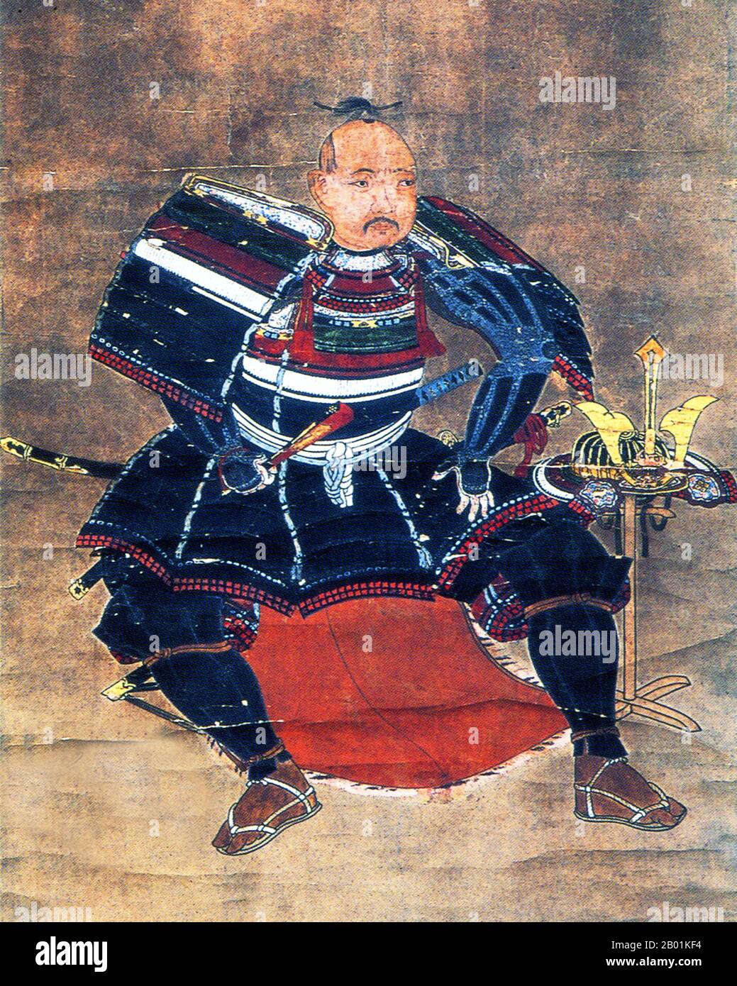 Japan: Hängendes Rollbild, das traditionell von Kira Yoriyasu (-10 Januar 1562) stammt, heute von Takeda Shingen (1. Dezember 1521 – 13. Mai 1573), Anfang des 17. Jahrhunderts. Takeda Shingen aus der Provinz Kai war ein bedeutender Daimyo im feudalen Japan mit außergewöhnlichem militärischem Prestige in der späten Phase der Sengoku-Zeit. Bekannt als „Tiger of Kai“, war er einer der mächtigsten und einflussreichsten Führer der Ära. Er ist berühmt für die Schlacht von Mikatagahara, wo er Tokugawa Ieyasu erfolgreich besiegte und dem zukünftigen Shogun eine seiner schlimmsten Niederlagen übergab. Stockfoto