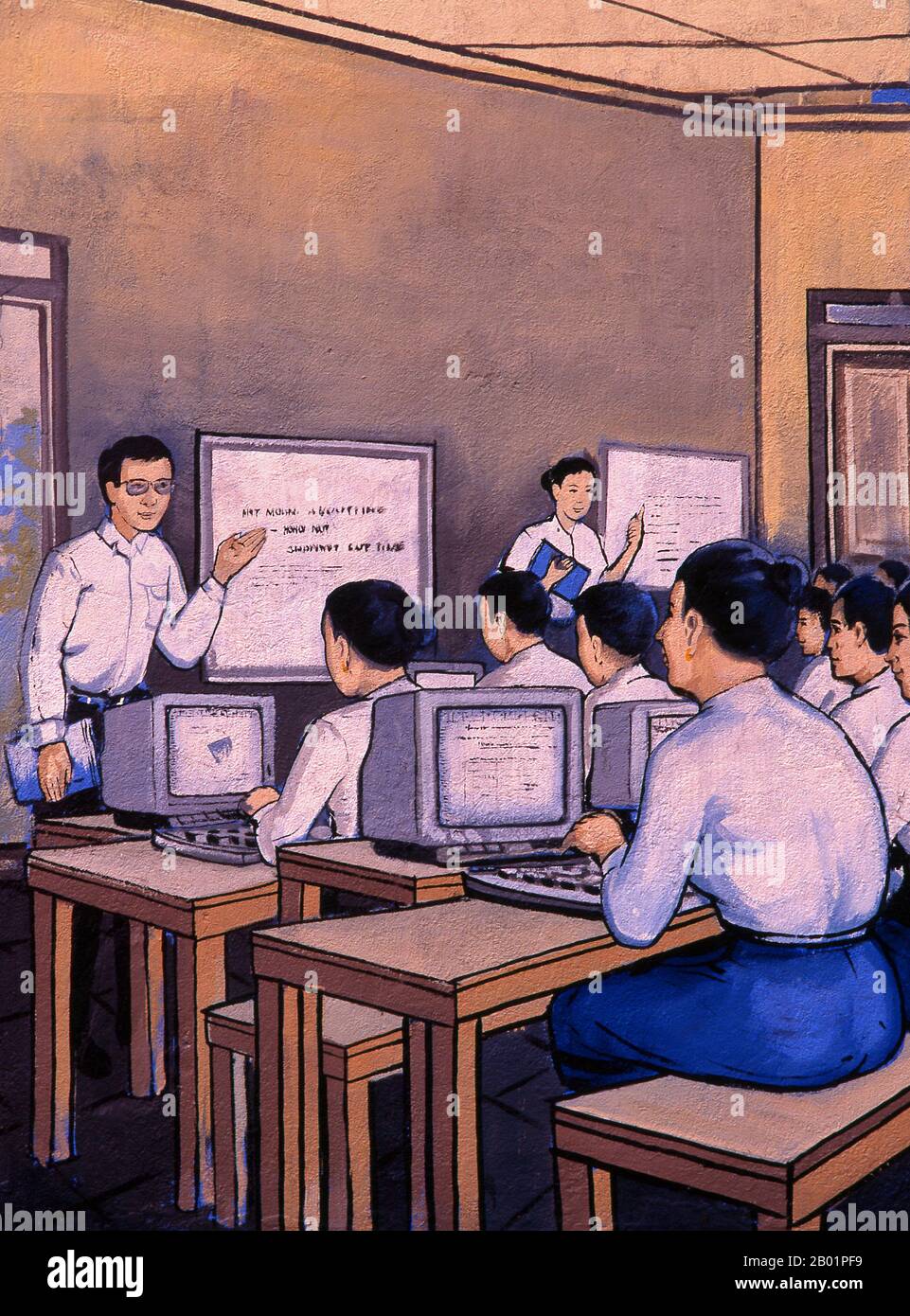 Laos: Bildung, politisches Poster im revolutionären sozialistischen Realismus auf den Straßen von Vientiane. Der sozialistische Realismus ist ein Stil realistischer Kunst, der in der Sowjetunion entwickelt wurde und in anderen kommunistischen Ländern zu einem dominierenden Stil wurde. Der sozialistische Realismus ist ein teleologisch orientierter Stil, dessen Ziel die Förderung der Ziele des Sozialismus und des Kommunismus ist. Obwohl sie damit verbunden ist, darf sie nicht mit dem sozialen Realismus verwechselt werden, einer Art von Kunst, die Themen sozialer Belange realistisch darstellt. Anders als der soziale Realismus verherrlicht der sozialistische Realismus oft die Rolle der Armen. Stockfoto
