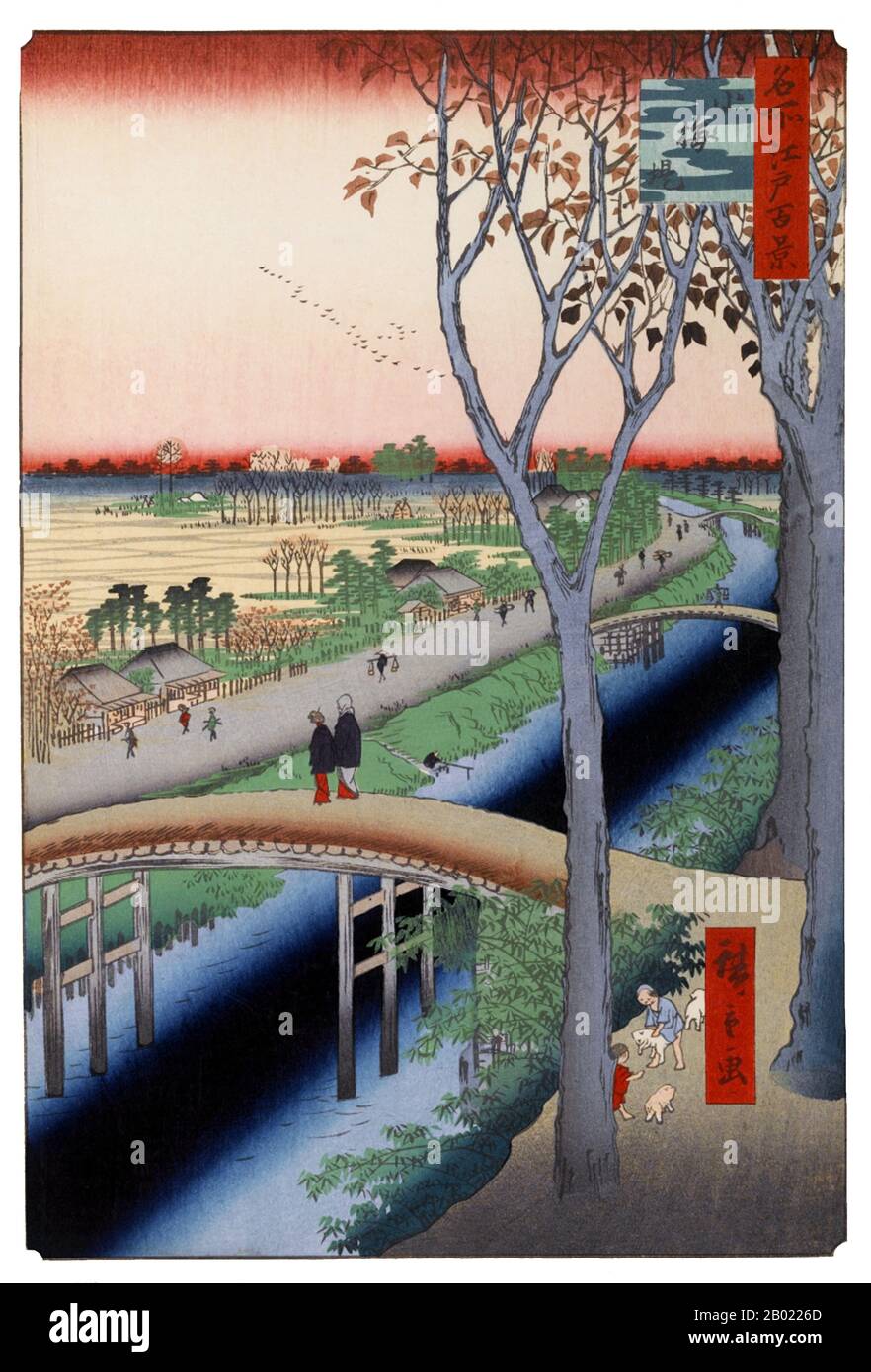 Japan: Oshiage: Koume Embankment und Yotsugi Dōri Canal. Bild 104 von Teil 4 (Winter) von „100 berühmte Ansichten von Edo“. Ukiyo-e Holzschnitt von Utagawa Hiroshige (1797-1858), um 1856-1859. Hiroshiges 100 berühmte Ausblicke auf Edo, die sich aus 118 Holzblocklandschaften und Genreszenen aus Tokio Mitte des 19. Jahrhunderts zusammensetzen, ist eine der größten Errungenschaften der japanischen Kunst. Die Serie enthält viele der berühmtesten Drucke Hiroshiges. Es ist eine Feier des Stils und der Welt der besten kulturellen Blüte Japans am Ende des Tokugawa-Shogunats. Stockfoto