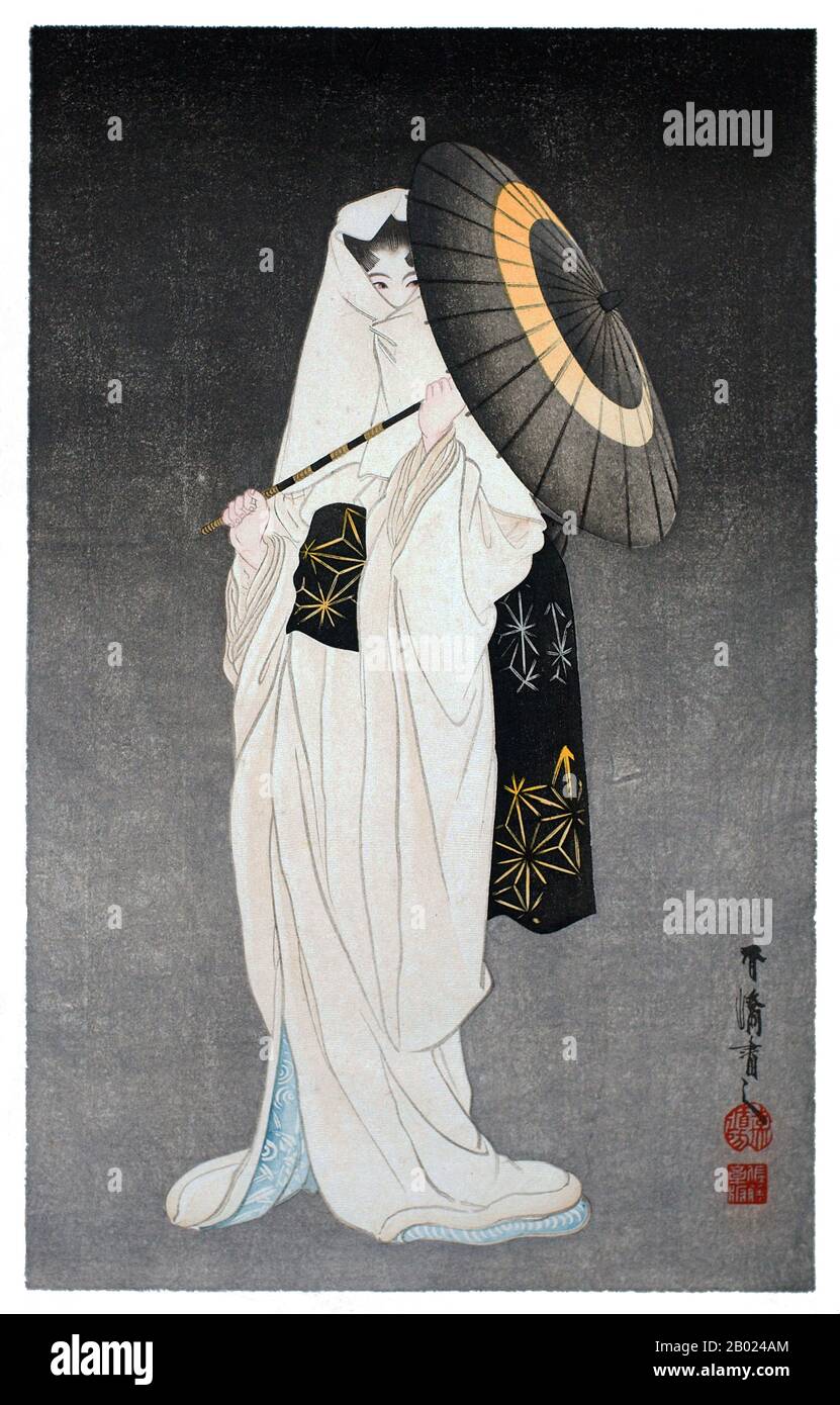 Japan: „Reihermädchen/Reihermädchen (Sagi Musume)“. Ukiyo-e Holzschnitt von Taniguchi Kokyo (1864-1915), um 1910er Jahre Taniguchi Kokyo war der zweite Sohn des Tuchhändlers Tsuji Kyujiro. Er war einer der Gründer der modernen Kyoto-Schule und lehrte an der Kyoto Municipal School of Fine Arts and Crafts und am Kyoto College of Fine Arts. Krankheit hat seine Karriere unterbrochen. Er malte hauptsächlich Landschaften, Vögel und Blumen sowie historische Motive. Stockfoto