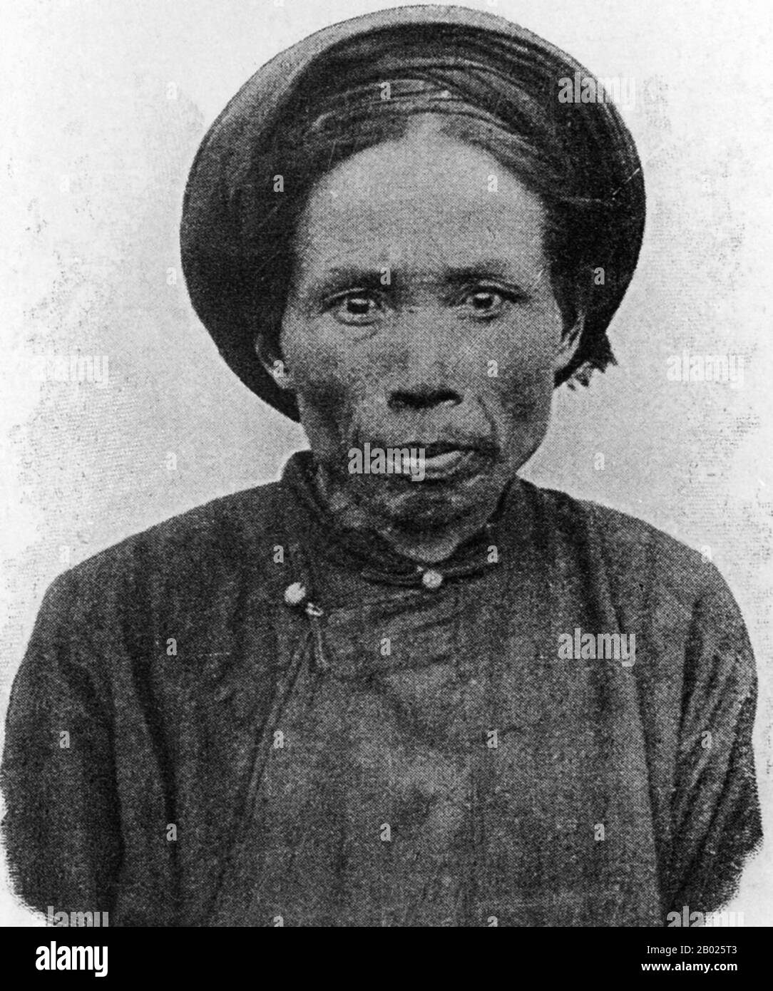 Laos: Laotische Frau, Ende des 19. Jahrhunderts. Das Königreich Laos existierte vom 14. Bis zum 18. Jahrhundert und wurde dann in drei getrennte Königreiche aufgeteilt. 1893 wurde es ein französisches Protektorat mit den drei Königreichen Luang Prabang, Vientiane und Champasak, die sich zu dem heute als Laos bekannten Gebiet vereinigen. Das Land erlangte 1945 nach der japanischen Besatzung kurzzeitig die Unabhängigkeit, kehrte aber zur französischen Herrschaft zurück, bis es 1949 die Autonomie erhielt. Laos wurde 1954 unabhängig, mit einer konstitutionellen Monarchie unter König Sisavang Vong. Kurz nach der Unabhängigkeit beendete ein langer Bürgerkrieg die Monarchie. Stockfoto