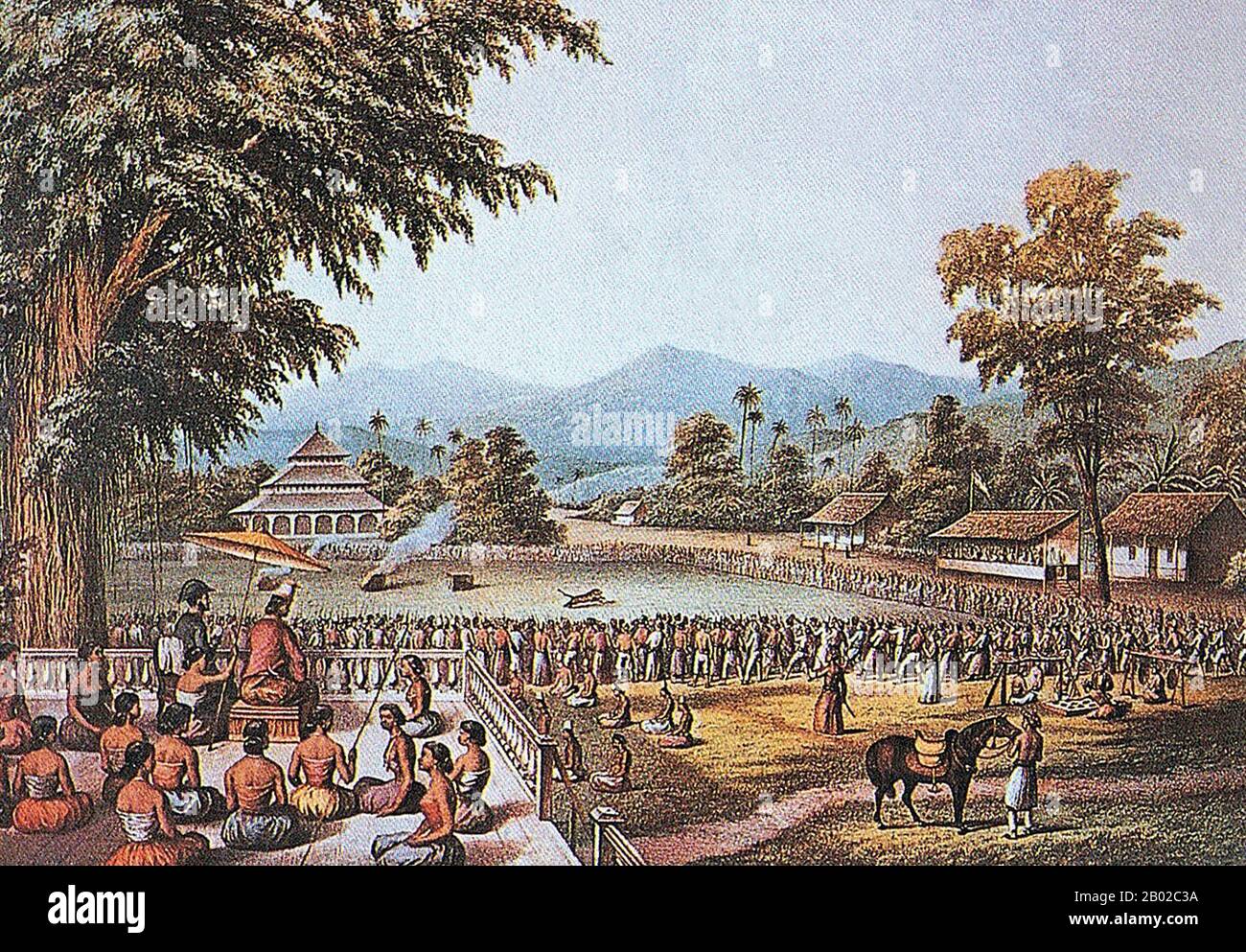 Indonesien: Ein „Rampok Makan“ oder aufwendig inszenierter Tigerkampf in Java, Mitte des 19. Jahrhunderts. Lithografie von Louis Henri Wilhelmus Merckes de Stuers (1830-1869) aus 'de Indische Archipel', den Haag, 1876. Rampok Macan waren javanische Zeremonien, die sich auf die Tötung von Tigern konzentrierten, vielleicht als symbolischer Weg für die Menschen, ihre Vorherrschaft über die Natur zu bestätigen, aber auch um die Vorherrschaft des Sultans, raja oder Herrschers im Zentrum des Mandalas oder Machtkreises zu bekräftigen. Die Tiger wurden nicht per se geopfert, sondern in einen Kampf gezwungen, der ihren Tod praktisch garantierte. Stockfoto