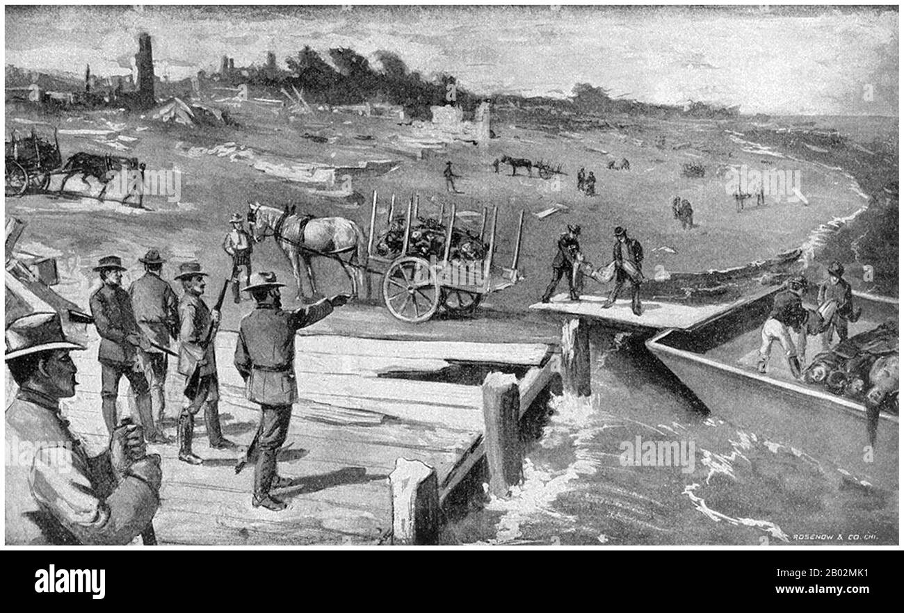 Der Hurrikan von 1900 machte am 8. September 1900 in der Stadt Galveston, Texas, in den Vereinigten Staaten Landfall. Sie hatte bei Landfall Windgeschwindigkeiten von 145 Meilen pro Stunde (233 km/h) geschätzt, was sie zu einem Sturm der Kategorie 4 auf der Saffir-Simpson-Hurrikan-Skala machte. Es war der tödlichste Hurrikan der US-Geschichte. Der Hurrikan verursachte mit der geschätzten Zahl der Todesopfer zwischen 6.000 und 12.000 Personen einen großen Verlust an Leben; die in offiziellen Berichten am meisten zitierte Zahl liegt bei 8.000, was dem Sturm nach dem Großen Hurrikan von 1780-98 Hurrica die dritthöchste Anzahl an Toten oder Verletzungen eines atlantischen Hurrikans bescherte Stockfoto