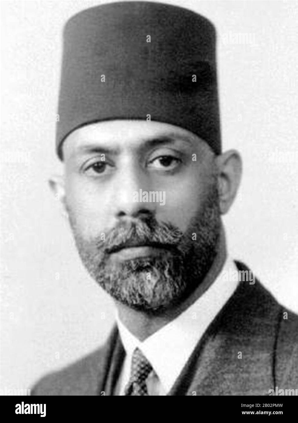 Choudhry Rahmat Ali (Urdu: چودھری رحمت علی‎) (16. November 1895 - 3. Februar 1951) war ein pakistanischer muslimischer Nationalist, der einer der ersten Befürworter der Entstehung des Staates Pakistan war. Ihm wird zugeschrieben, den Namen "Pakistan" für eine eigene muslimische Heimat in Südasien geschaffen zu haben und allgemein als Gründer der Bewegung für ihre Entstehung bekannt zu sein. Stockfoto