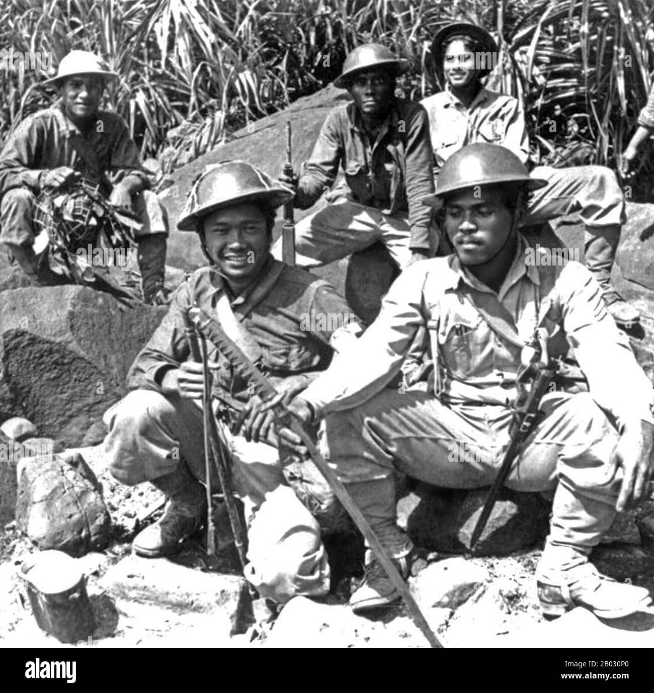 Die Schlacht von Bataan stellte die intensivste Phase der Invasion der Philippinen durch das imperiale Japan während des zweiten Weltkriegs dar Im Januar 1942 marschierten Truppen der Kaiserlich japanischen Armee und Marine zusammen mit mehreren Inseln im philippinischen Archipel nach der Bombardierung des amerikanischen Marinestützpunktes in Pearl Harbor in Luzon ein. Der Oberbefehlshaber aller philippinischen und amerikanischen Streitkräfte auf den Inseln, General Douglas MacArthur, konsolidierte alle seine in Luzon stationierten Einheiten auf der Halbinsel Batan, um gegen die japanischen Invasoren zu kämpfen. Bis zu diesem Zeitpunkt kontrollierten die Japaner fast ganz Südostasien. Th Stockfoto