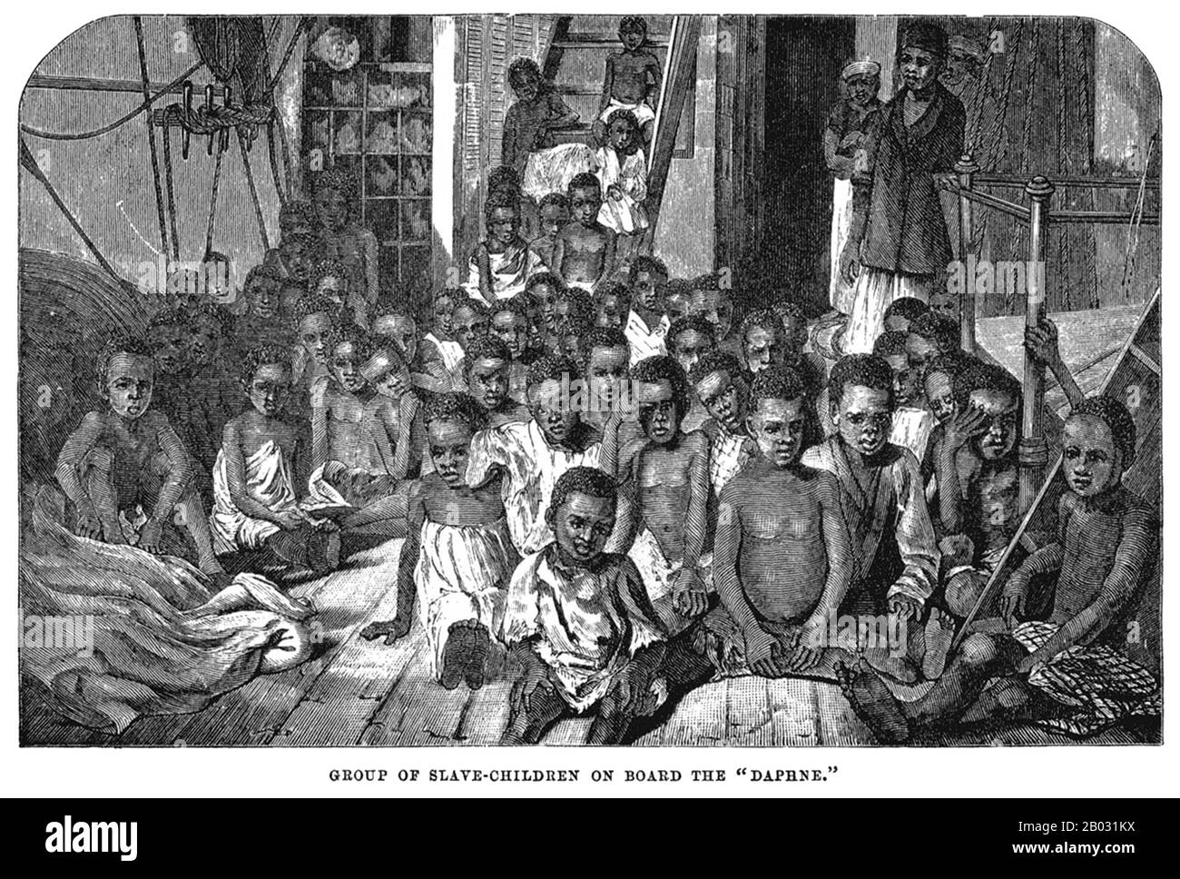 Diese Kinder sind einige der fünfundneunzig, die von einem britischen Schiff (der Daphne), das 1869 das Wasser vor Sansibar patrouillierte, aus der Sklaverei gerettet wurden. Nachdem das Parlament den Handel mit Sklaven abgeschafft hatte, wurden Schiffe der Royal Navy zugewiesen, um die Slaver abzufangen und die menschliche Ladung an Bord zu befreien. Während diese Gravur auf der Grundlage eines Fotos von George Sullivan die Bedingungen entlang Afrikas Ostufer darstellt, gab es dieselbe Situation auf der atlantischen Seite. Stockfoto
