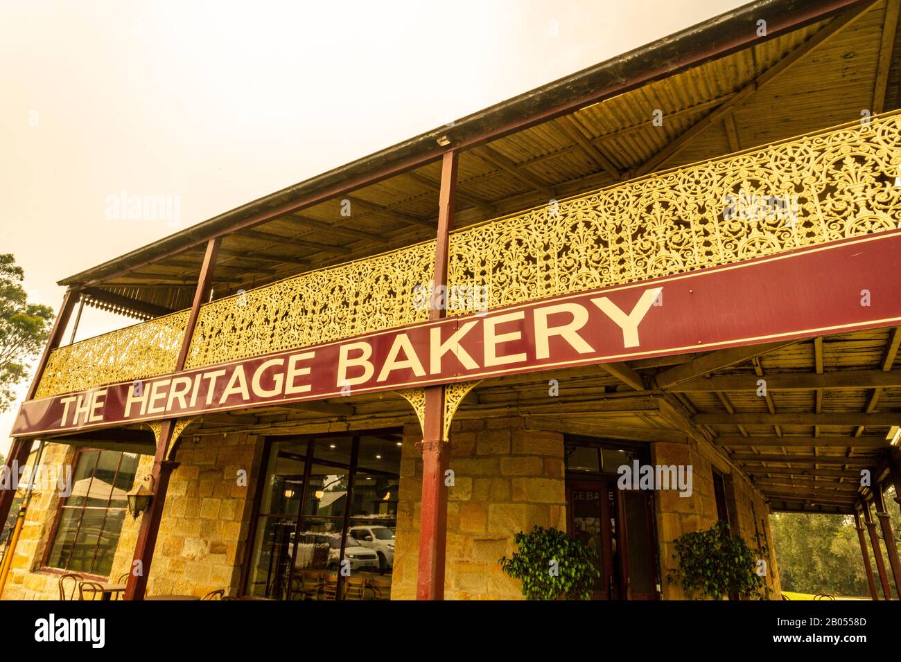 Detail des 1870 im georgianischen Stil erbauten Heritage Bakery House während der Buschfeuer im Dezember 2019 in Milton, Shoalhaven, Nsw, Australien Stockfoto