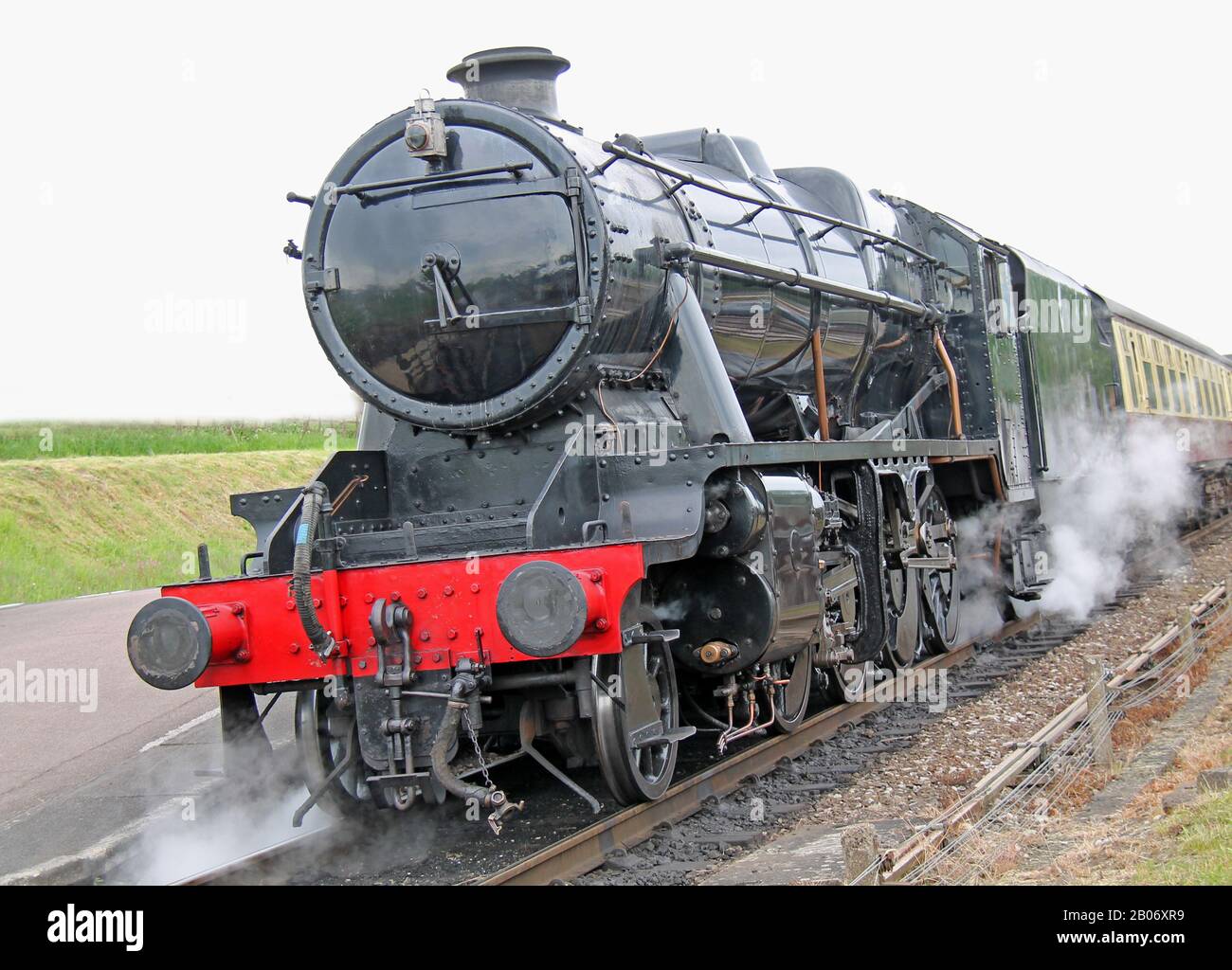 Eine Leistungsstarke Dampfmaschine, Die Einen Vintage-Zug Zieht. Stockfoto